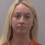 Teacher charged