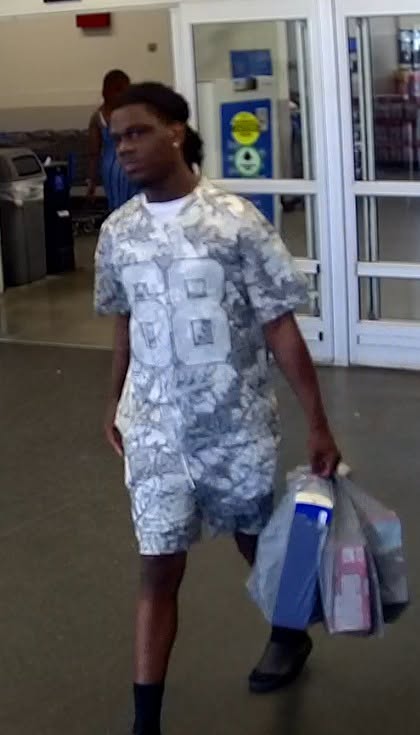Lexington Police searching for someone accused of taking items from Walmart